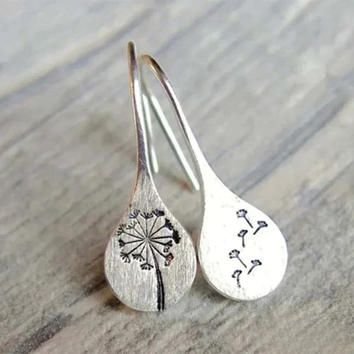 Elegante Silberohrringe im Dandelion-Blatt-Design